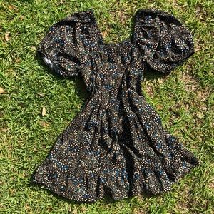 black dress with small flower print, size M